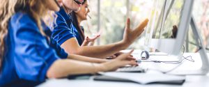 Group of happy call center smiling business operator customer su